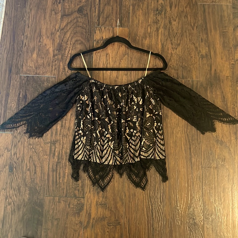 Black lace off the shoulder crop top, with beige lining under lace